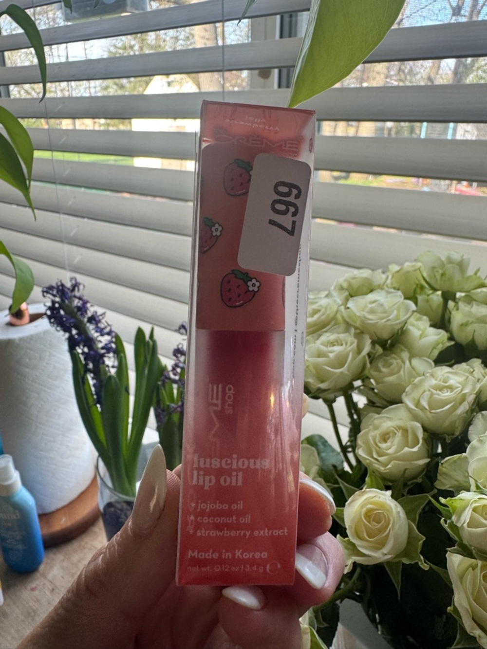 The Crème Shop Luscious Lip Oil in the strawberry scent